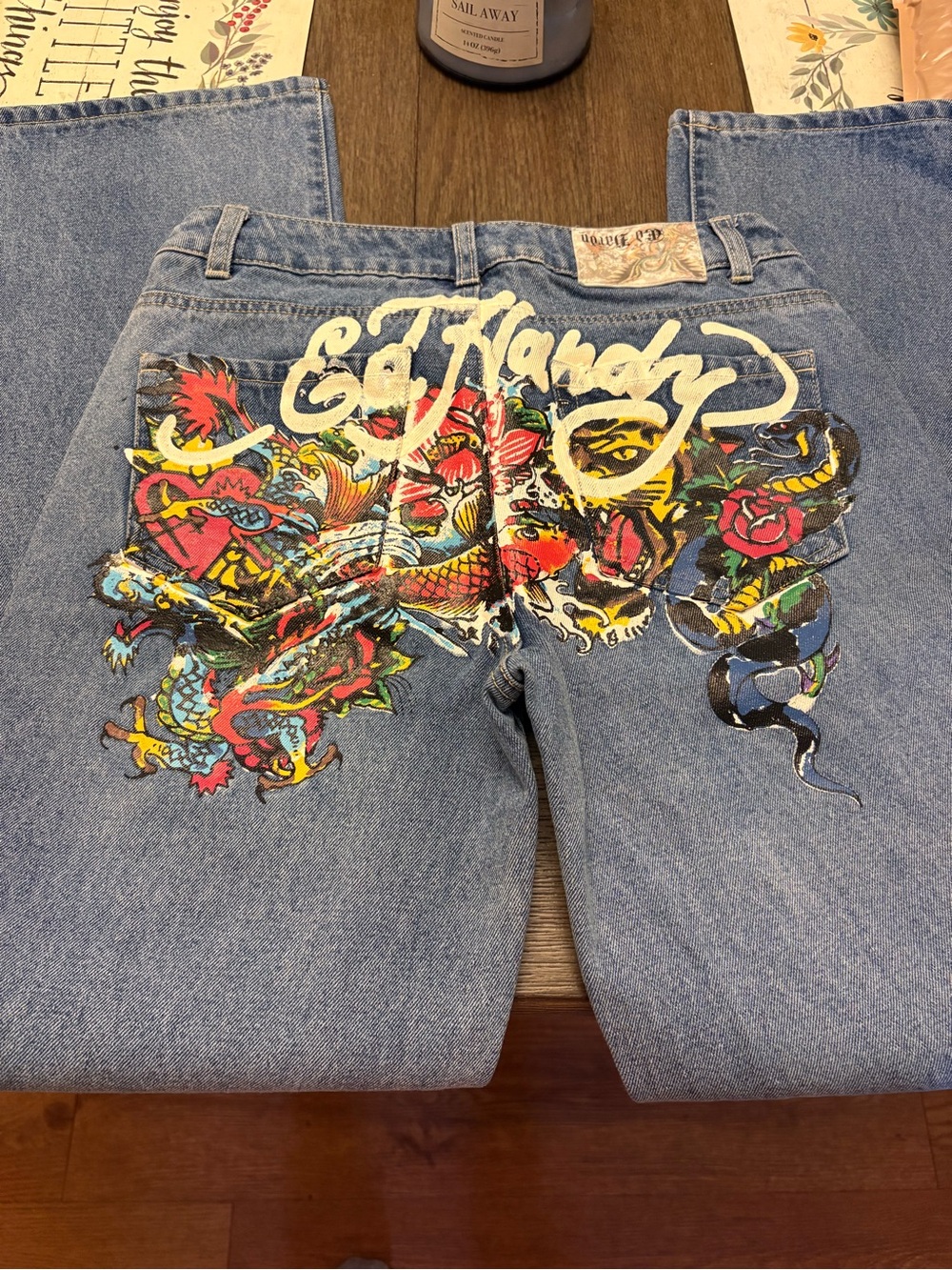 Ed Hardy Women’s Light Blue Denim Bootcut Jeans Low Rise with Tattoo Graphic
